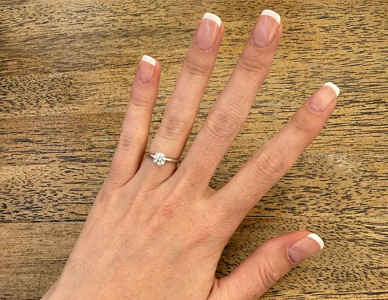 Couple holding hands and flowers